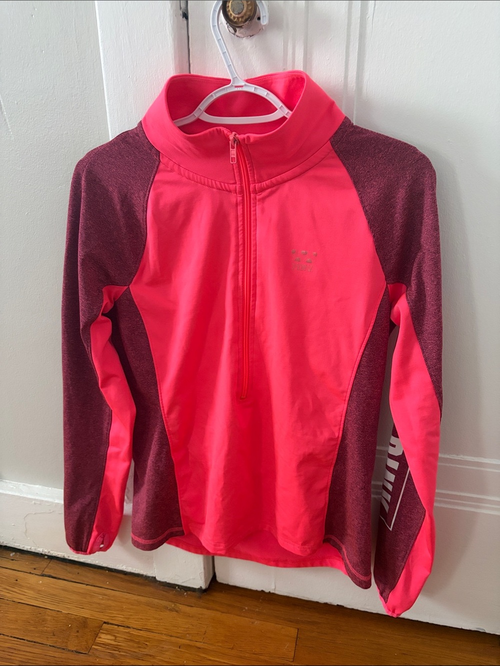 Women’s athleisure half zip in hot pink and maroon